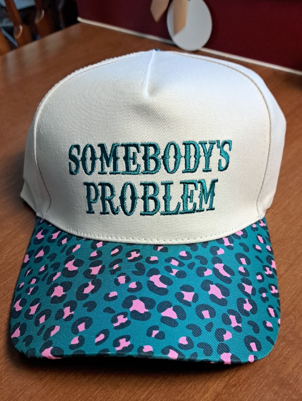 Somebody's Problem Embroidered Trucker Hat - Teal & Pink Leopard Visor